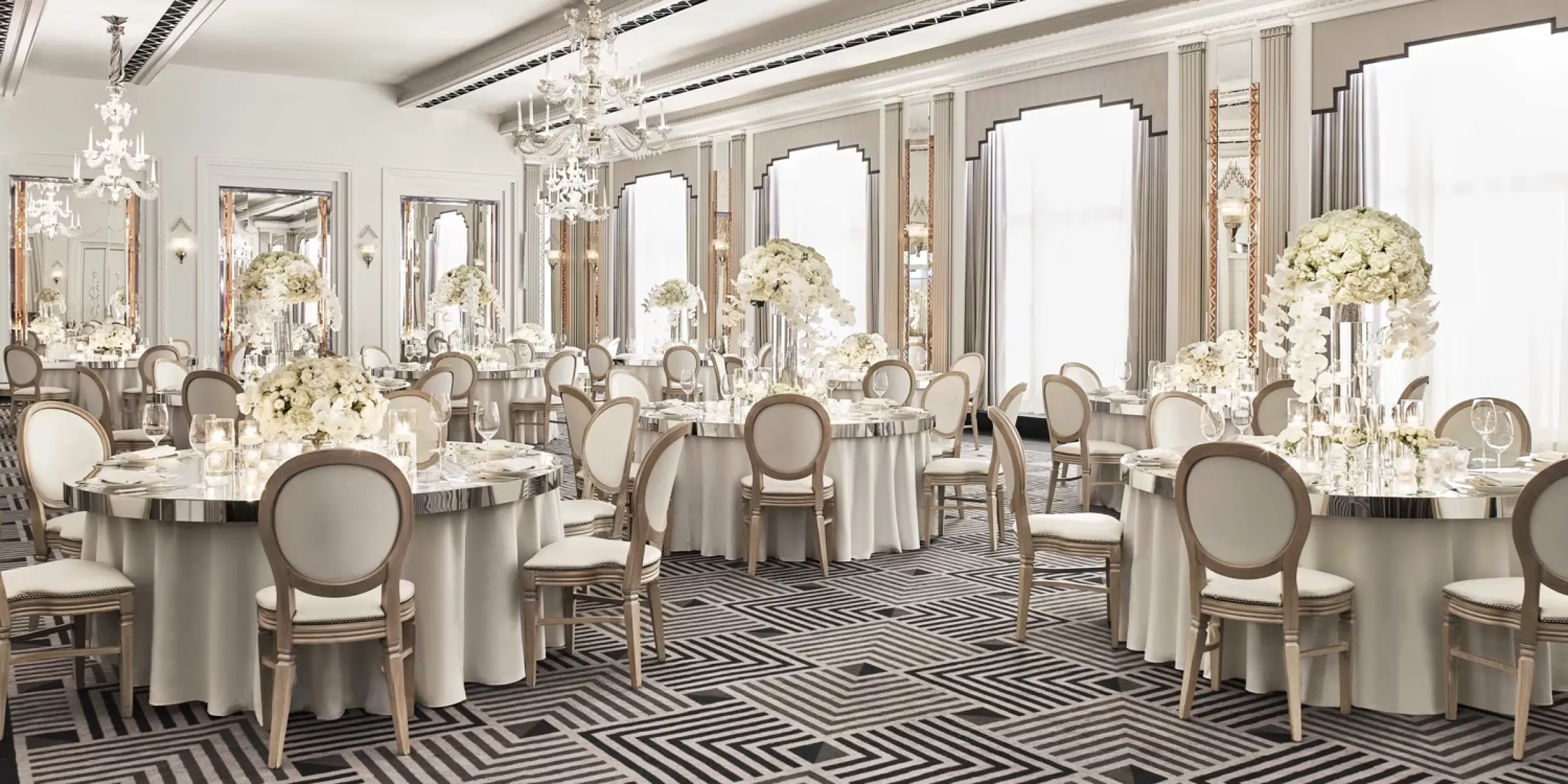 Grand hotel ballroom set for a private event